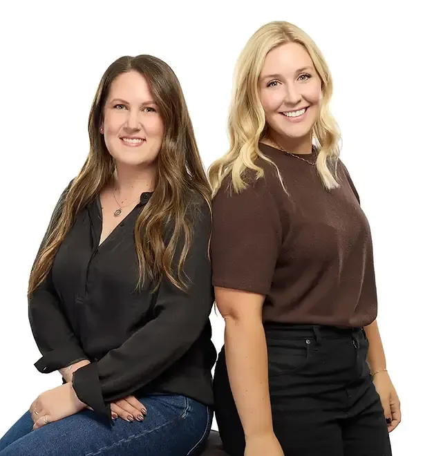 Two smiling women photographed for a professional brand